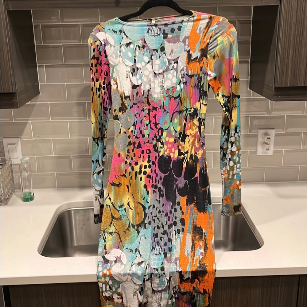 Made by Good time. Very fitted dress. Like new